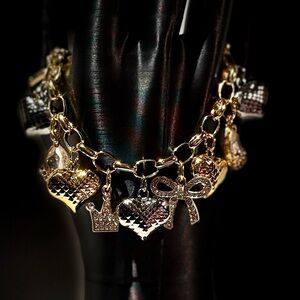 Gold and Silver Charm Bracelet